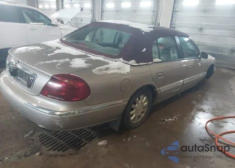 2000 Lincoln Continental z USA, uszkodzony, nr VIN 1LNHM97V5YY861793